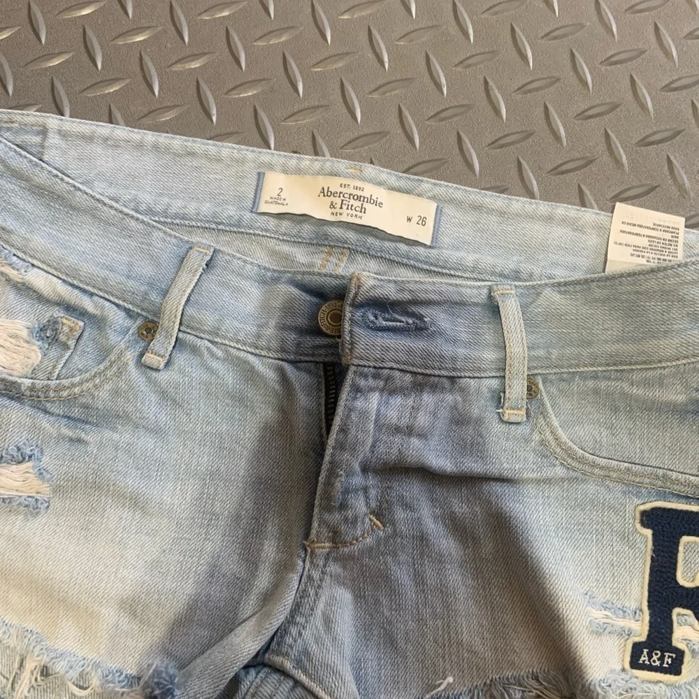 Y2k Abercrombie shorts denim faded cut off frayed classic preppy logo spring